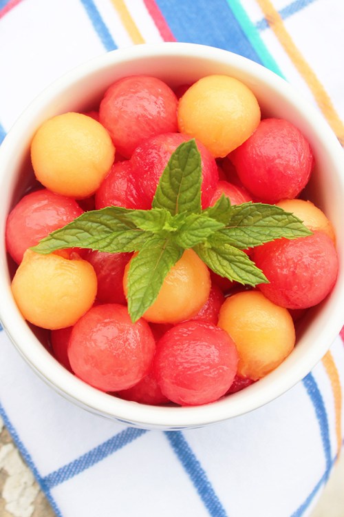 cantaloupe and watermelon in ginger sugar sauce